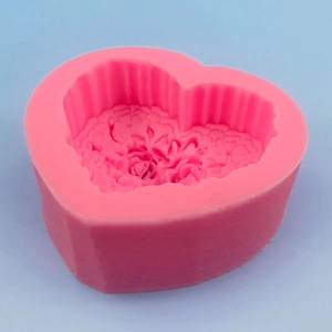 Pink heart-shaped silicone mold with rose flower texture for soap and cake decorating