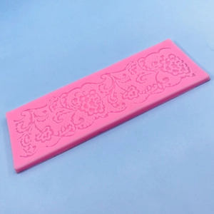 Pink silicone lace mold with floral patterns for fondant and cake border decoration