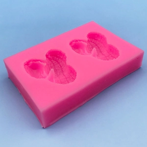 Pink silicone peanut mold with two cavities for DIY cake fondant and chocolate making