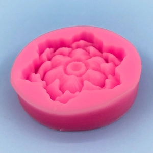 Macro detail of a pink silicone lotus mold showing intricate flower petal textures for DIY