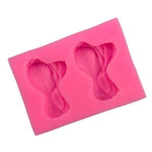 Pink silicone mold featuring cabbage and leaf shapes for DIY fondant cake decoration