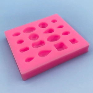 Pink silicone mold with geometric shapes for DIY jewelry making and cake decoration