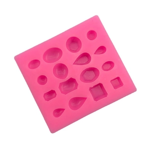 Pink silicone mold featuring 16 geometric gem shapes for DIY resin or cake fondant decor