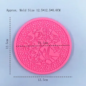 Pink circular silicone mold with traditional Chinese floral bird pattern for DIY baking