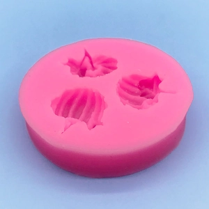 Pink 3-cavity silicone mold for vegetable and pumpkin shapes for Halloween DIY baking