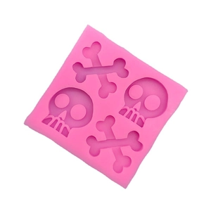 Pink silicone skull and crossbones mold for Halloween DIY chocolate and cake fondant