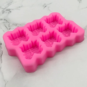 Pink 6-cavity silicone mold featuring traditional Double Happiness symbols for chocolates