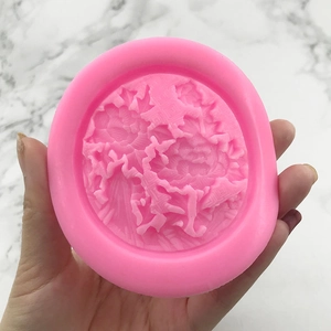 Pink silicone mold with dragon and flower relief for fondant and cake decoration