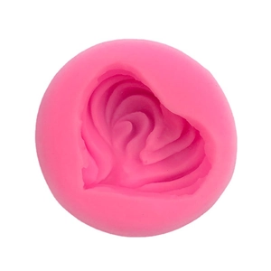Pink heart-shaped silicone mold with detailed rose floral patterns for DIY soap and cakes