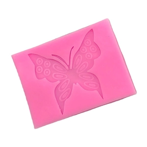 Pink silicone butterfly mold for baking chocolates and fondant with detailed textures