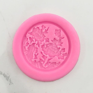Detailed macro view of pink silicone mold with Chinese peony floral relief pattern
