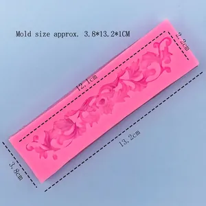 Pink silicone fondant mold with detailed floral pattern for cake border decoration