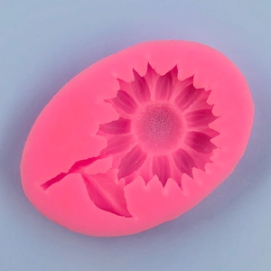 Macro shot of pink sunflower silicone mold showing detailed petals and center texture