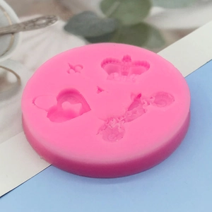 Pink silicone mold with heart, crown, and key patterns for DIY cake fondant and chocolate