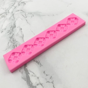 Pink silicone long-strip mold with 5 square geometric patterns for cake and chocolate