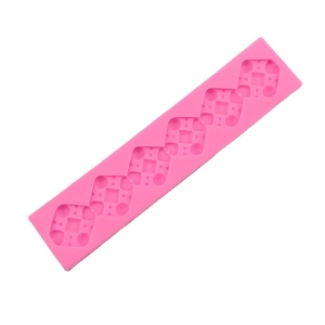 Pink silicone mold with long geometric square patterns for fondant and cake borders
