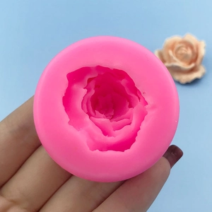 Pink silicone rose flower mold for handmade soap and candle making with fine petal texture