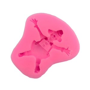Pink silicone clown mold for DIY chocolate fondant and cake decoration on white background