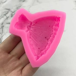 Pink silicone fondant mold in wedding dress shape for DIY cake decorating and crafts