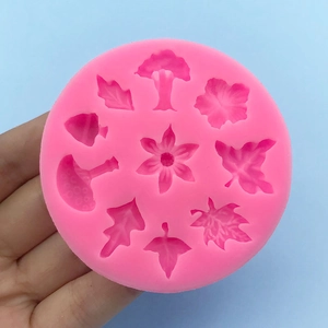 Pink silicone mold for DIY flower and maple leaf fondant cake decorations
