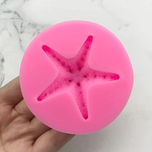 Pink starfish silicone mold for DIY baking and chocolate with realistic surface texture