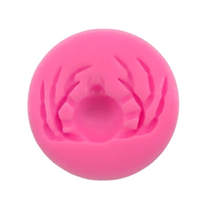 Pink spider shaped silicone mold for Halloween baking and DIY chocolate crafts