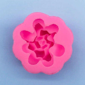 Macro view of 3D pink rose flower silicone mold for DIY succulent candles and chocolate