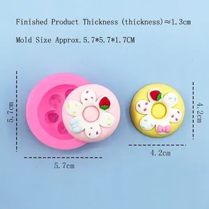 Silicone donut mold with bow strawberry patterns and detailed size measurements