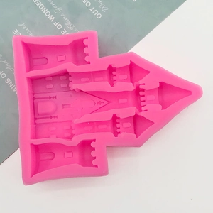 Detail of pink silicone 3D castle mold showing intricate towers for fondant and chocolate