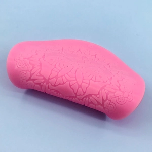 Pink silicone lace mold for round cakes with elegant floral embossed patterns