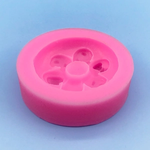 Pink silicone mold with five-petal flower design for DIY soap and chocolate making