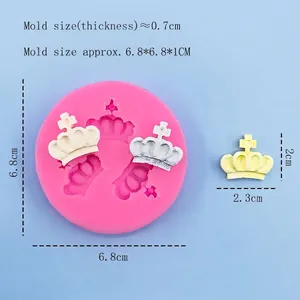 Pink silicone mold with three crown shapes for DIY cake decorating and crafts