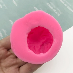Pink silicone lion dog mousse mold for detailed cake decorating and DIY crafts