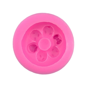 Pink silicone mold featuring six petal cavities with cute bow tie cat and donut shapes