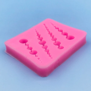 Stampo in silicone rosa per bordi a perla per torte con quattro scanalature a onde