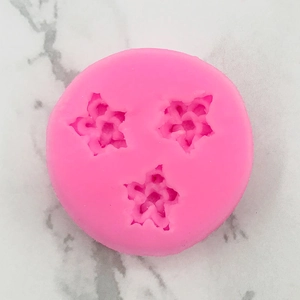 Stampo in silicone rosa con tre cavità floreali per decorazione torte e cioccolato