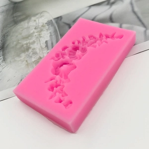 Pink silicone floral wreath mold for DIY fondant cake decoration and chocolate baking