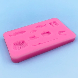 Pink silicone fishing set mold for fondant and DIY crafts with fish and rod patterns