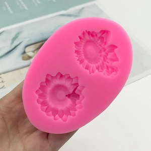 Pink silicone sunflower mold with double cavities for DIY chocolate or fondant decoration