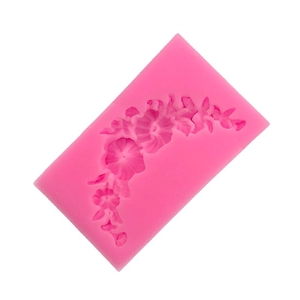 Pink floral silicone mold for DIY fondant cake decoration with curved vine and leaf patterns