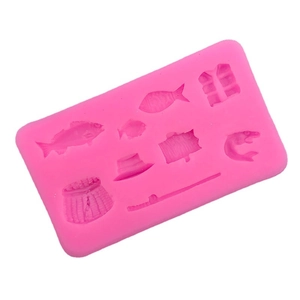 Pink silicone mold featuring fishing theme shapes like fish, rods, and hats for DIY baking