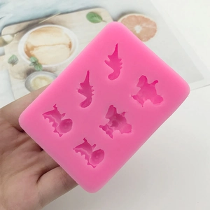 Pink silicone mold with 6 animal shapes for fondant, chocolate, and DIY cake decorations