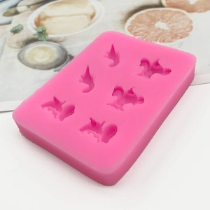 Pink silicone mold with animal shapes for fondant cake decorating and DIY chocolate