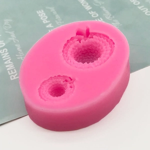 Pink silicone mold featuring two 3D spiral wave designs for fondant cake decoration