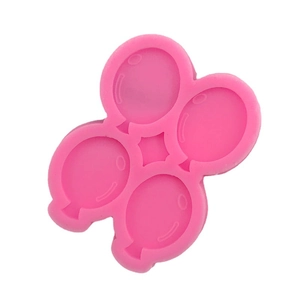 Pink food-grade silicone balloon mold for chocolate and cake decorating with four cavities