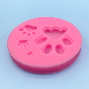 Pink silicone dog paw print mold for cake baking and DIY chocolate resin crafts