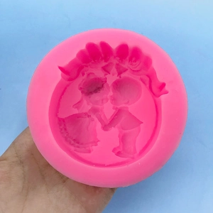 Pink silicone mold with a couple in a floral arch for DIY handmade soap and cakes