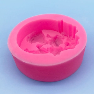 Cylindrical pink silicone mold for DIY wedding soap and candle making with relief details