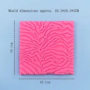 Pink silicone texture mold for fondant cake and soap making measuring 10.1x10.1cm