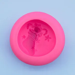 Detailed pink silicone mold for DIY Christmas stockings with stars and candy canes